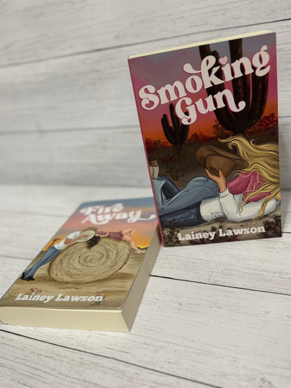 Smoking Gun Signed Paperback + Free Sticker