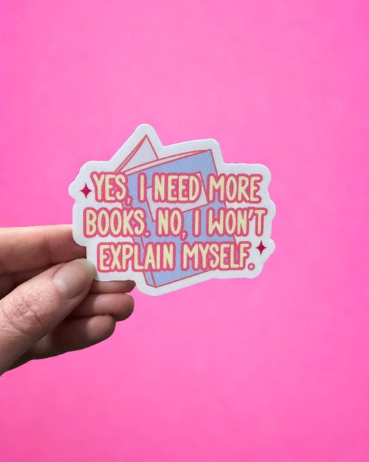 Sticker with text held against a pink background